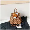 Ins mochila pequeña estilo coreano de nicho bolsa de doble hombro para niñas 2026 nueva linda mini mochila infantil de lunares moderna
