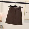 Saia midi de veludo cotelê preta plus size gorda mm outono e inverno que modela o quadril roupa feminina saia evasê emagrecedora versátil saia de um passo saia curta
