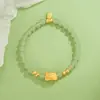 Pulseira de Dumpling Cozido Yilong para Mulheres, Ano do Dragão, Design de Nicho de Luxo Leve, Pulseira com Pingente da Sorte de Jade Hetian Sintético