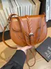 Bolso pequeño vintage 2026 nueva moda bolso de hombro de alta gama para debajo del brazo elegante versátil bandolera tipo silla de montar