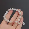 Pulsera de Cristal Transparente con Lazo Ojo de Gato Elegante Lujo Ligero Nicho Exquisita Joyería de Mano Versátil de Gama Alta