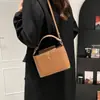 Textura de Moda Verano 2025 Gran Capacidad Nuevo Lujo Ligero Elegante Casual Bolso Pequeño Cuadrado de Hombro Cruzado de Mano