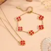 Collar de Corazón de Oro de 18 Quilates Acero de Titanio Lujo Accesible Acero Inoxidable de Gama Alta Impermeable con Goteo de Aceite por Ambos Lados Collar de Flor de Cuatro Hojas de la Suerte