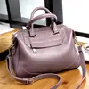 Bolsas de mano genuinas de cuero europeas y americanas, nuevos estilos de moda 2026, bolsos tote para mujer, bandoleras de piel de vaca, venta al por mayor desde Guangzhou