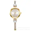 Más vendido Nuevo Flor de Diamante Incrustado Diamante de Color Simple Moda Pulsera con Cordón Reloj de Cuarzo para Mujer Alto Valor