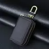 Estuche para llaves de cuero genuino: Protección de doble capa, diseño minimalista en negro y marrón. ¡Duradero y Elegante!