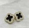 Trevo de Quatro Folhas Diamante Metal Pendurado Banhado Botão Costurado à Mão Camisa Jaqueta Feminina Terno Jaqueta Puffer Suéter Botão Estilo Chanel