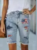 Shorts de mezclilla rasgados de alta elasticidad con estampado de bandera americana para mujer, exclusivamente para ventas transfronterizas, estilo casual de pierna recta