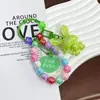 Nuevo Llavero Colgante de Conejo Acrílico Tridimensional Galvanizado Accesorios Pequeños Frescos de Colores con Cuentas Decoración para Cubierta de Auriculares