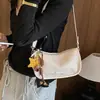 Bolsa de pão macia com textura de trama de alta qualidade para mulheres, novo estilo 2026, bolsa versátil e elegante de ombro único, transversal, para o trabalho, de mão, bolsa almofada