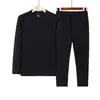Atacado TransfronteiriçoConjunto de roupa íntima térmica masculina de veludo alemão de alta qualidade, gola redonda, blusa base de cor sólida