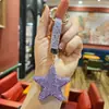 Llavero de Estrella de Cinco Puntas con Diamantes Incrustados de Dibujos Animados Transfronterizo, Colgante para Bolso de Mujer Estilo Simple de Moda Japonesa y Coreana, Exquisito Accesorio de Decoración para Coche