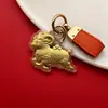 Amuleto de la Suerte del Año de la Oveja Llavero de Ovejita Bolso Dorado Cadena para Teléfono Colgante Souvenir Exquisito de Negocios Regalo