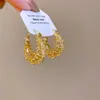 Pendientes de aro cruzados europeos y americanos, estilo artístico vintage old money, pendientes de moda y sencillos, lujo ligero con un toque de alta gama, venta al por mayor