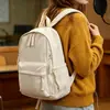 Mochila casual de color liso para exteriores, nueva, transfronteriza, mochila de gran capacidad, mochila versátil y ligera estilo coreano
