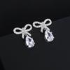 Doce Micro-incrustado Super Flash Zircon Bow Water Drop Brincos ins Design Simples Luz Luxo High-end Brincos para Mulheres