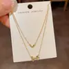 Collar Cruzado Europeo y Americano Personalizado de Metal con Forma de Corazón y Lazo, Cadena para Clavícula Elegante, Sencilla y de Diseño