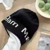 Ins gorro de punto con letra de personalidad de nicho sombrero coreano de otoño e invierno frío sombrero cálido para protección de orejas sombrero tipo piel de melón sombrero de punto callejero tendencia