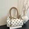 Bolso de hombro grande de lunares de nicho transfronterizo 2026 primavera nuevo elegante temperamento extranjero alto para mujer