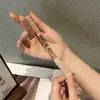 Adecuado para Apple iwatch7/SE/6/5/4/3 correa de metal con diamantes + funda tipo ladrillo estilo pequeño y fragante punto