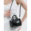Transfronterizo 2026 Verano Nuevo PU Estilo Coreano Moderno Único Pequeño Cuadrado Bolso de Mano Bolso Cruzado de Moda Nicho de Moda Bolso de Hombro para Mujeres