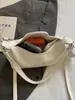 Bolso de Mano Simple de Nicho Estilo Coreano Shuai Mi Home para Mujer Verano 2026 Nueva Moda Bolso de Hombro Cruzado para el Trabajo