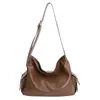 Bolsa tote feminina 2026 novo modelo, bolsa de ombro de grande capacidade, elegante e moderna, adequada para as aulas de estudantes universitários e para o trajeto diário, bolsa de mão feminina