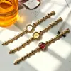 Reloj de pulsera de lujo ligero vintage, reloj de pulsera de cuarzo para mujer estilo antiguo en oro de alto valor, nuevo modelo de comercio exterior para mujer