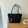 Bolso grande tejido con patrón transfronterizo para mujer, nuevo bolso tote casual de gran capacidad, bolso de hombro de moda y texturizado para el día a día