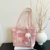 Bolso de mujer 2026 nuevo diseño de moda, bolso de hombro versátil de gran capacidad, alto atractivo estético, adecuado para la escuela y el trabajo, bolso tote moderno