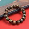 Cuero de tigre sándalo cuentas antiguas hombres y mujeres pulsera de mano cuentas de texto rosario sándalo joyería popular joyería de madera alrededor del dedo suave