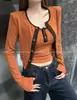 Nuevo top tipo camisola abotonado y plisado estilo coreano, camiseta de manga larga color block, cárdigan y conjunto de dos piezas falsas - un atuendo a la moda