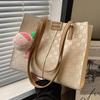 Bolso de gran capacidad para mujer, versátil, de verano 2023, nuevo, bolso de hombro a cuadros de alta calidad, bolso de mano de clase para ir al trabajo.
