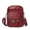 Bolsa pequena de couro macio feminina transversal novo estilo 2026 bolsa feminina multicamadas bolsa de ombro transversal da moda porta-moedas para celular