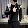 Otoño 2026 Nuevo Suéter para Hombre Estampado Bloques de Color Cuello Redondo Camiseta Base Moda Tendencia Manga Larga Sudadera Casual