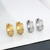 Brincos de aço inoxidável mais vendidos transfronteiriços personalidade tendência mesmos brincos de aço titânio para homens e mulheres cor de aço brincos de ouro 18K fecho de orelha