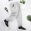 Pantalones Deportivos Infantiles Otoño/Invierno 2026 Pantalones de Chándal Casuales para Niños Pequeños Color Sólido Felpa Pantalones para Niños Estilo Coreano Versátil Ropa Infantil