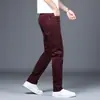Pantalones casuales para hombre, nuevos pantalones tipo cigarrillo ajustados de negocios color caqui para primavera y otoño, pantalones largos elásticos para hombre, versátiles de largo nueve puntos