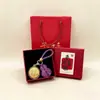 Chaveiro Pingente Dourado do Ano da Ovelha com Decoração em Folha de Ouro Conjunto em Caixa de Presente Personalizado para Negócios Presente Personalizado Atacado