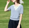 Diseño minimalista para el trayecto diario, top pullover de bloques de color estilo francés para el verano de 2026, camiseta básica de manga corta moderna y elegante
