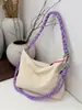 Bolsa de Axila Color-Blocking de Nicho Transfronteiriça para Mulheres, Nova Bolsa Transversal de Nylon Leve 2026, Bolsa Tote Casual Portátil