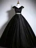 Vestido de noche negro para anfitriona, nuevo modelo 2026, vestido largo de lujo ligero de alta gama para ceremonias de adultos, exámenes de arte y actuaciones, con una falda elegante y voluminosa
