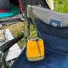 Tendência transfronteiriça viagem ao ar livre bolsa transversal leve masculina e feminina nova portátil com cordão bolsa para garrafa de água casual celular ombro único