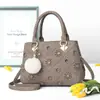 Bolsa feminina nova de verão 2021 estilo coreano acessórios pendurados ombro único PU bolsa feminina moda ombro único bolsa mensageiro