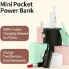 Nuevo Modelo Mini Power Bank Cápsula con Soporte y Cable Integrado, 5000mAh, Personalizado para Venta al por Mayor Transfronteriza