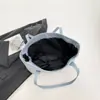 2026 Elegante Verano Nuevo de Moda Personalizado Moda para Viajar Simple Gran Capacidad Bolso Tote de Hombro Único para Mujer al por Mayor