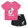 2023 Verão Infantil Gola Redonda Camiseta Calças Quentes Coreano Casual Base Camisa Suor-absorvente Doce Conjunto de Camiseta Infantil