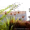 Instalaciones Metálicas Transfronterizas para Exteriores con Forma de Planta y Cascabeles Pintados para Instalación en el Suelo