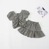 Traje de Cuadros para Niñas Transfronterizo 2024 Verano Estilo Coreano Top con Lazo en la Espalda Plisado y Culottes Conjunto de Dos Piezas