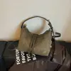 Bolso tipo cubo de gran capacidad con acabado mate retro, un bolso de hombro casual de nicho y elegante, perfecto para el uso diario y un bolso tote versátil para exportación